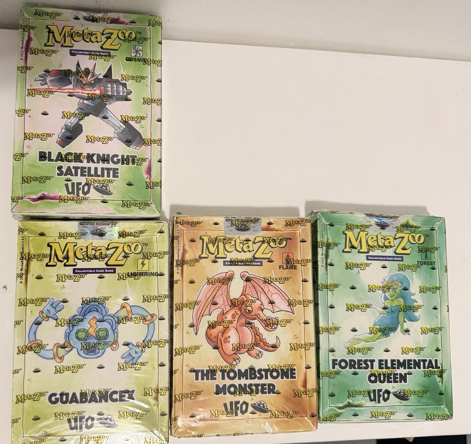 MetaZoo UFO Theme Decks Set of 4 Sealed! Plus Cryptid Nation Celebrations Mat!